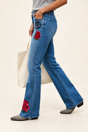 Rose-Embroidered Bootcut Jeans — angled view